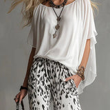 PENELOPE | KOMPLET BOHO CHIC S TOPOM A ANIMALIER NÁDHERNÝMI NOHAVIČKAMI